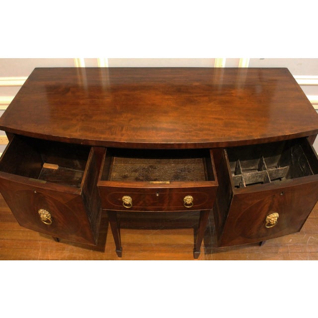 Circa 1770-90 George III small bowfront sideboard, English. Mahogany & mahogany veneers with oak secondary. Line inlays,...
