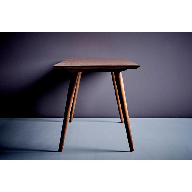 Coffee table designed by Paul McCobb for the Planner Group by Winchendon. Crafted from stained solid maple with beveled...