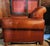 Beautiful French Club Chair with and rich cognac/whiskey leather, which has developed a beautiful natural patina over...