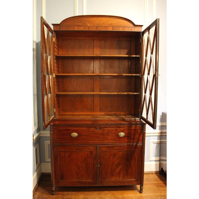Regency circa 1815 English Secretaire Bookcase Cabinet. Mahogany. Stately proportions & exceptional quality. The bookcase...
