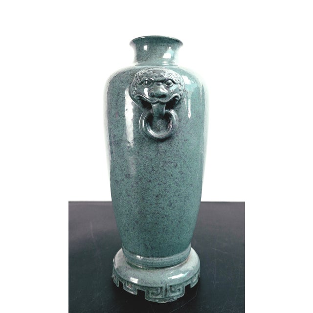 Chinese porcelain oilspot tongping, a finely formed, slim, sleeve shape vase with a turquoise and pale violet, oilspot...