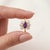 Elevate your jewelry collection with this captivating, vintage-inspired Marquise Amethyst Ring. This exquisite piece...