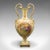 This is an antique flower vase. An English, ceramic baluster urn with Continental decor, dating to the early 20th century,...