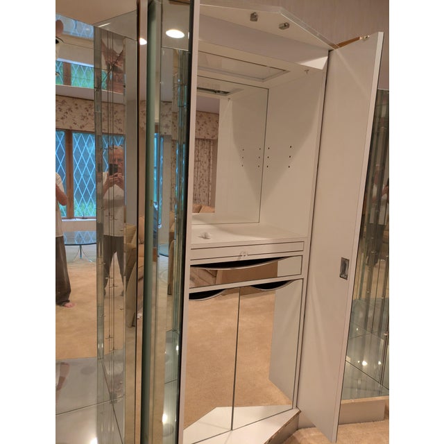 1990's mirrored wall unit. Needs two mirror repairs which was done on moving. Piece is large heavy and fragile so need...