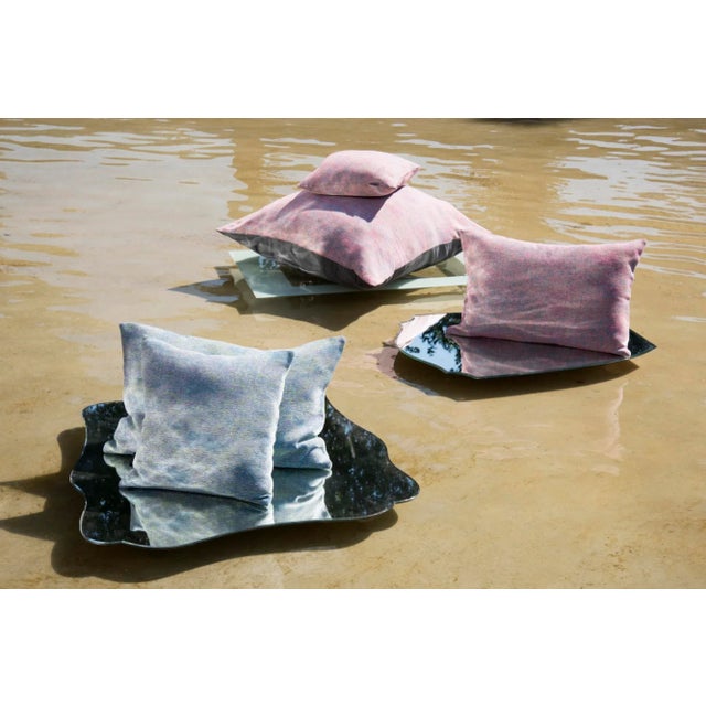 Reflet&nbsp;captures the glistening of a lake in a padded texture.&nbsp; This piece is covered in pastel blue woven...