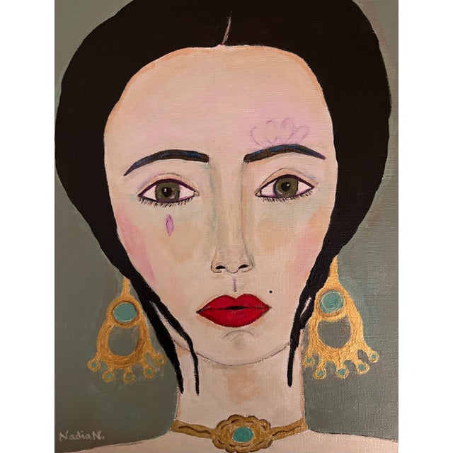A contemporary portrait painting of a woman with large gold earrings done on canvas panel board and acrylic paint. Comes...