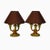 This Art Deco lamp is made of brass with green and gold patina. It has a circular base with three arms of light with...