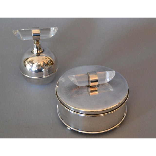 Elegant Mid-Century Modern Vanity Set comprising a Silver-plated Perfume Bottle and a Glass bowl with Silver plated Powder...