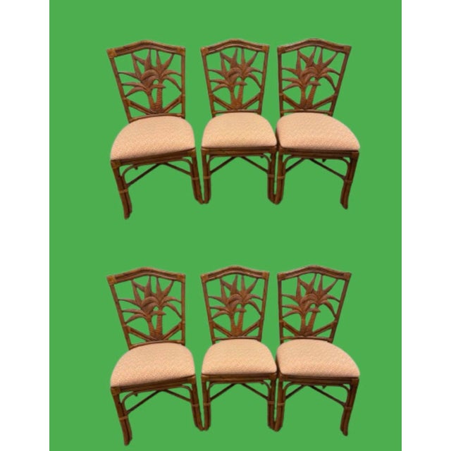 A great set of 6 tropical style dining chairs, they are in fabulous shape only used for staging. Beautiful back with palm...