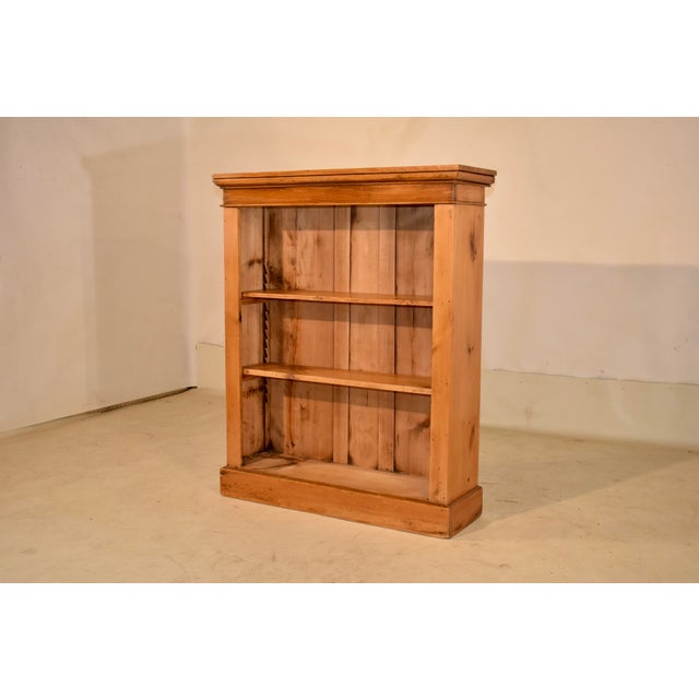 19th century pine bookcase from England. This is a bookcase in a great size! The top crown give the bookcase stature and a...