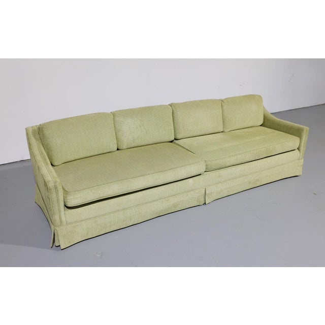 A striking vintage sofa with an exceptionally long 105-inch profile and classic 1970s styling. While the designer and...
