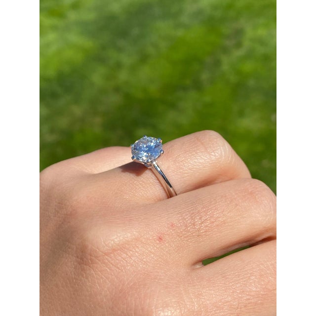 The Tikal: 14K White Gold Solitaire 3CTW Moissanite Engagement Ring. Simplicity meets beauty with this classic styled...