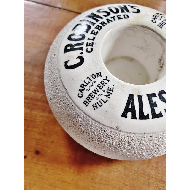 A lovely antique English stoneware match strike, made to be used in a pub to advertise C. Robinson's Ale & Stout. In great...