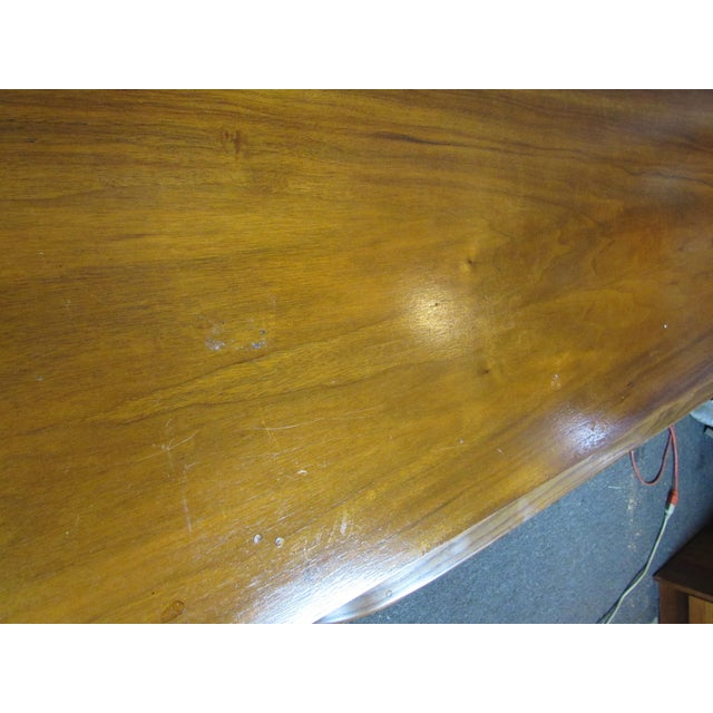 Wonderful walnut coffee table with unique bentwood legs! Authentic mid-century modern design provides timeless...