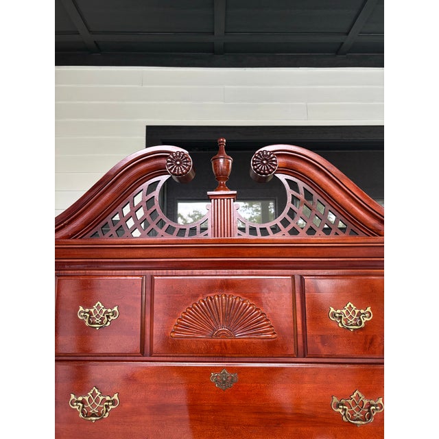 Elegant and timeless, this Open Home Exclusively by Stanley highboy chest features a rich cherry finish, classic brass-...