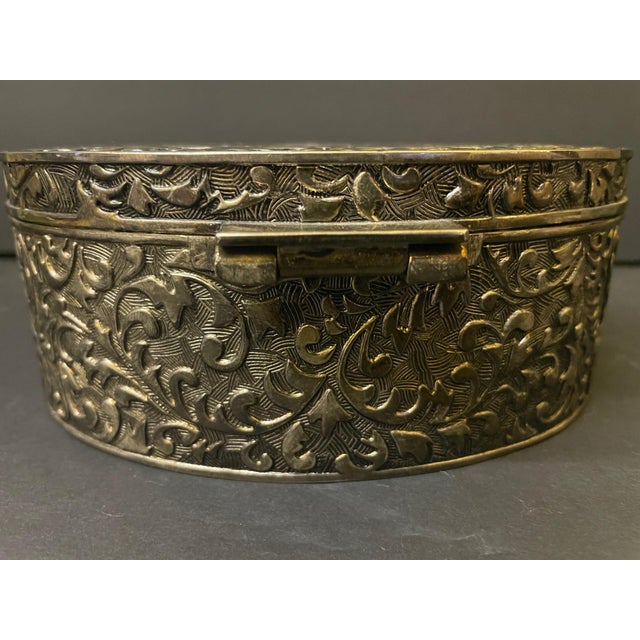 Add vintage elegance to your vanity or dresser with this striking oval trinket box. The exterior features a highly...