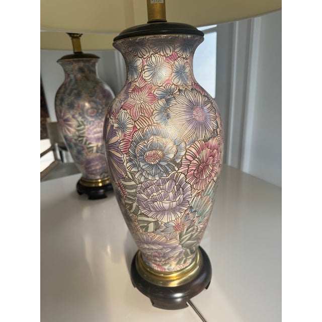 Beautiful matched pair of vintage Frederick Cooper Chicago table lamps featuring exceptionally detailed floral-decorated...