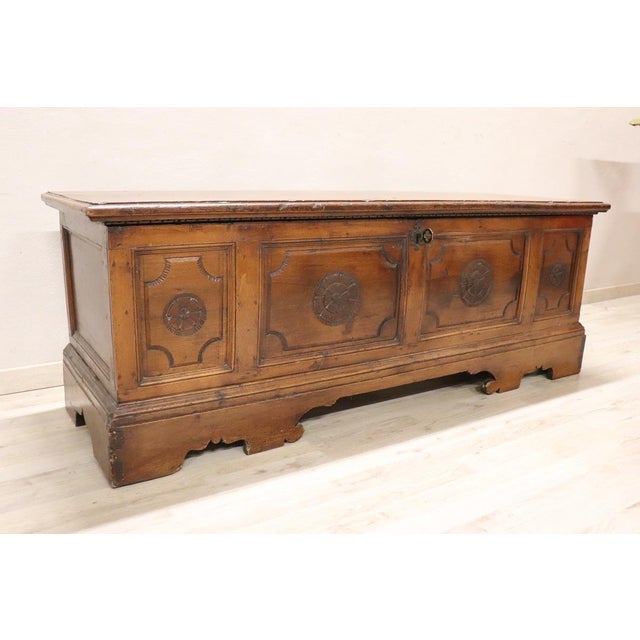 Refined antique Italian chest dating in the 18th century. Crafted from solid walnut, its warm, rich brown color lends it a...