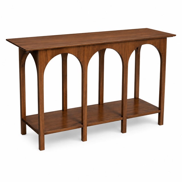 Modern mid century style console in the manner of Robsjohn Gibbings arch console. Console is in excellent condition....