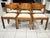 Set of six chairs attributed to Regain France, vintage 1980. Chairs made entirely of solid elm in an amber finish, with...