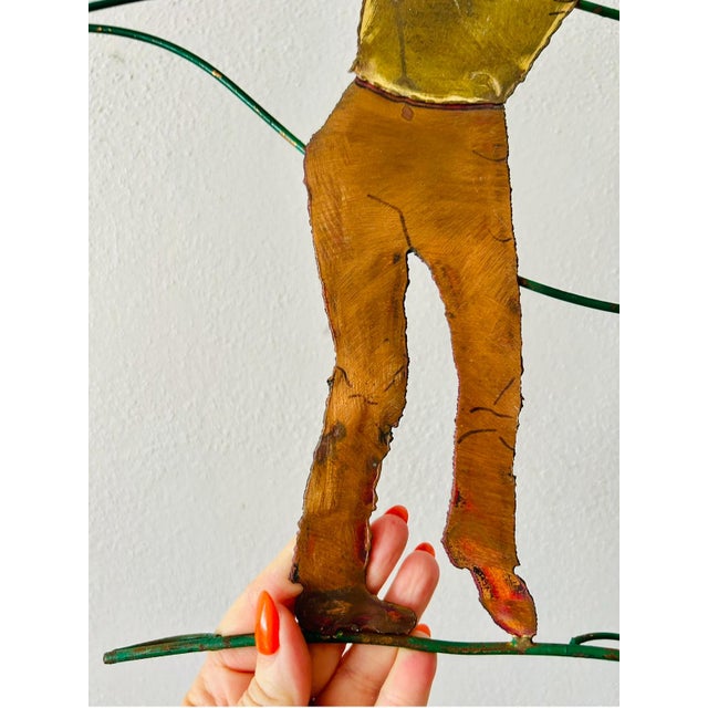 This MCM sculpture by John Bergasse features a golf theme, with a medium-sized design crafted from metal. The piece is...