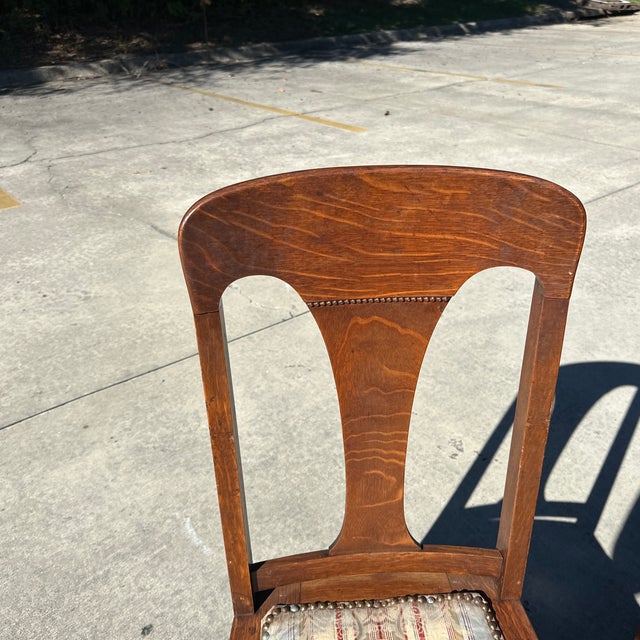 Up for consideration is a beautiful vintage set of wooden dining chairs with studded cushions. These would look lovely in...