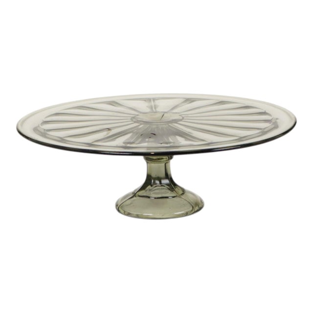 A large and rare vintage cake stand from the Art Deco period, made of grey-tinted pressed glass (also known as Depression...