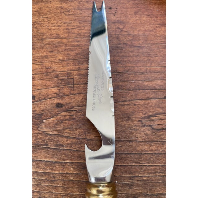 This is a very handsome and well made cheese knife! Made in the 1960s this is substantial and heavy solid brass. It is...