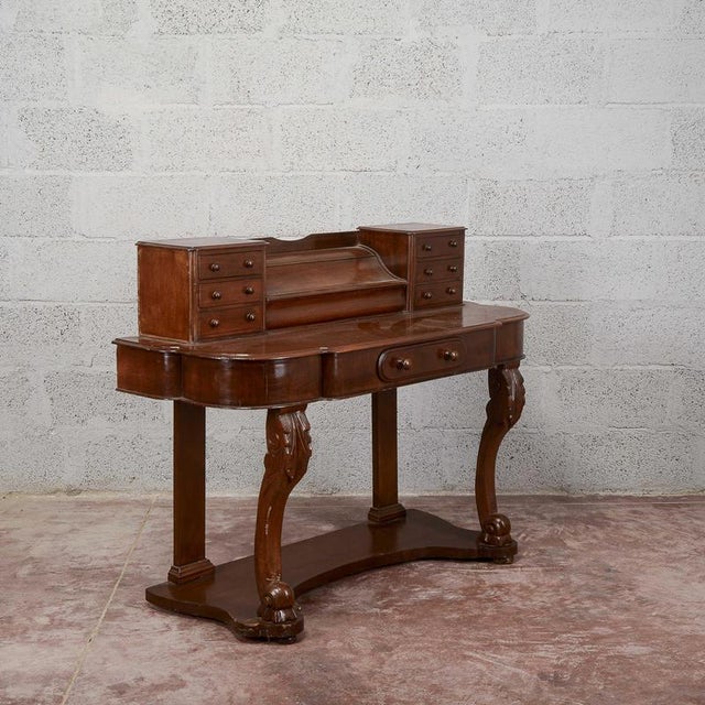 This refined 19th-century mahogany desk embodies the classic elegance and understated style of European antiques. The...