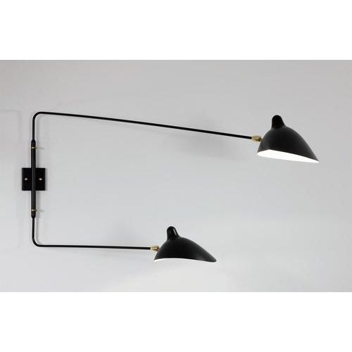 Wall lamp model "two rotating straight arms wall lamp" designed by serge mouille in 1954. Manufactured by editions serge...