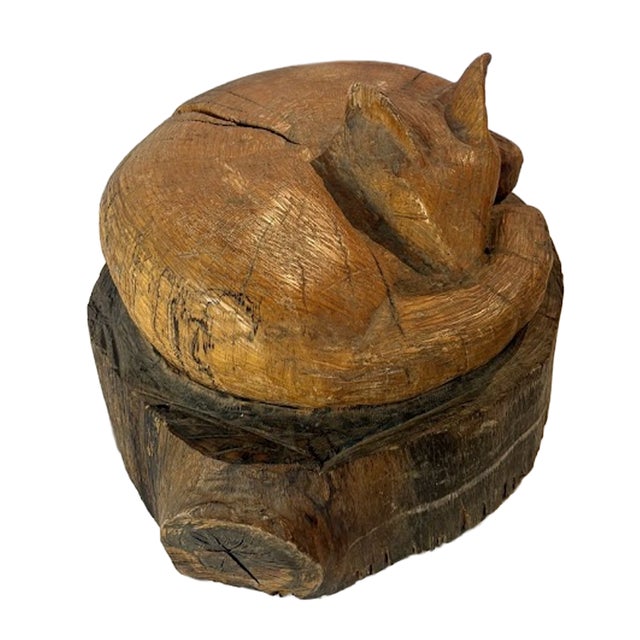 What a cozy looking fox to curl up in your home! Hand carved from a log with a stable, calm expression—this vintage folk...