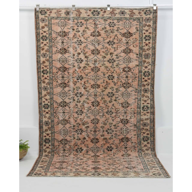 Vintage Hand-Knotted area rug is a semi-antique vintage area rug. The '70s Eastern region of Anatolian's unique rug is...