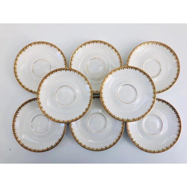 Set of eight vintage porcelain French Limoges saucers beautifully elegant gilt rims. Marked, "Elite Works, Limoges,...