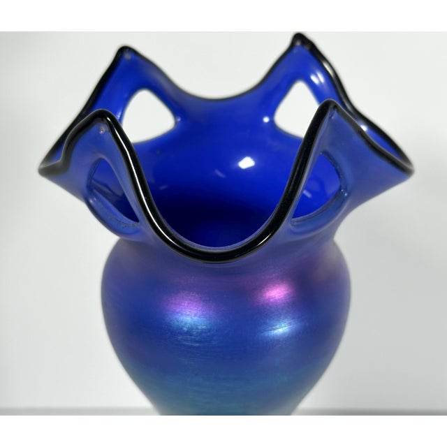 Rare & Original Loetz Iridescent Blue Pierced Vase for your consideration. The vase is a nice large size, measuring...
