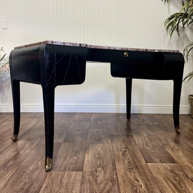 Stunning authentic Maitland-Smith writing desk featuring a dramatic 1980s glam / Hollywood Regency–inspired design. This...
