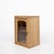 A charming French table cabinet from around 1900, crafted in solid wood with a warm natural finish and a single glass-...