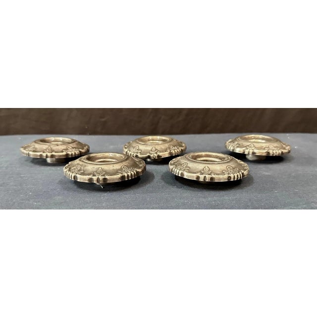 These vintage sterling silver bobeches are designed with a border of scrolls, accented with floral sprays. The base of...