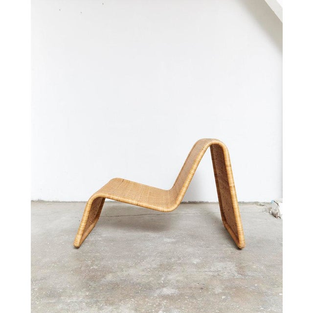Ergonomic rattan lounger from Ikea. Hand-woven natural cane. Very good condition. Minimal imperfections in the rattan. I...