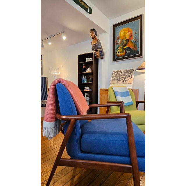 This is a Thayer Coggin private label style lounge chair in cherrywood. In its most current version it's the Thayer Coggin...