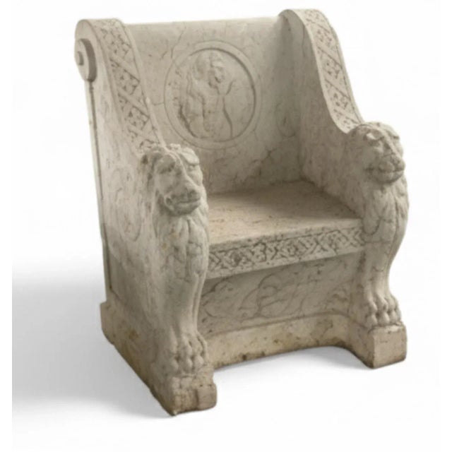 A dramatic and heavy carved stone chair originating from a historic home on Star Island, Miami. Crafted in the Roman or...
