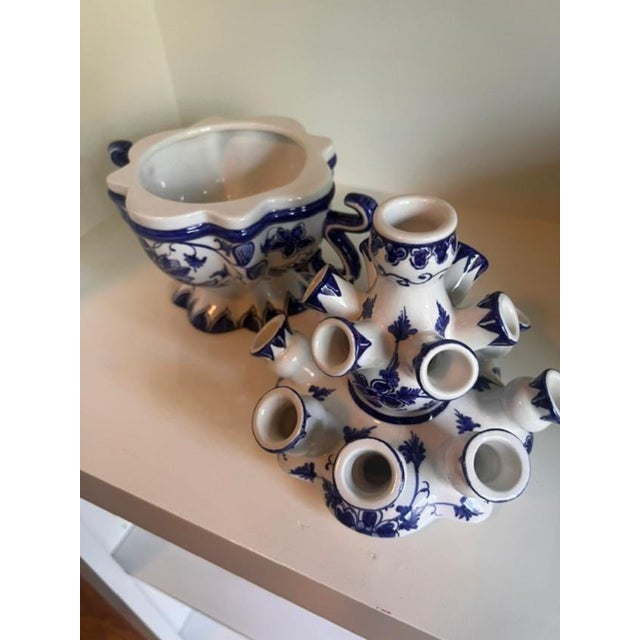 This iconic Dutch tulip vase, known as a tulipiere, is a classic piece featuring a tiered, multi-spout design. It was...