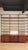 Striking mid-century modern wall unit in the style of George Nelson, featuring a versatile modular shelving system with...