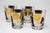 Set of 6 gold and black coin barware double old fashioned glasses by Cera Glass. Mid-century 1960s Cera 22-karat gold and...