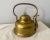 Rustic brass plated tea kettle with a copper handle, purchased at a flea market in Belgium in the 1960s. This large tea...