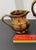 Pretty petite antique Staffordshire Copper Lustreware creamer with a hand-painted gold band at neck with a line of beading...