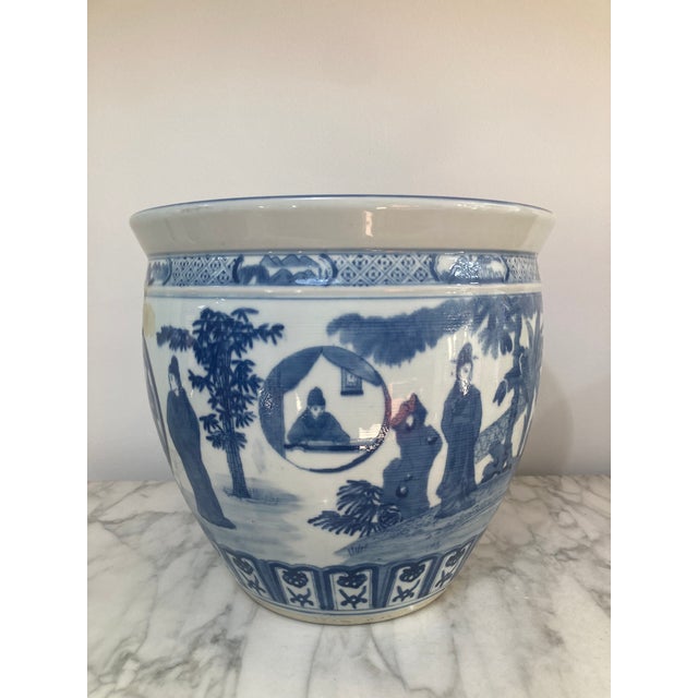 Beautiful Blue and White Porcelain Asian Cache Pot. Gorgeous hand painted details. Add this amazing pot to your...