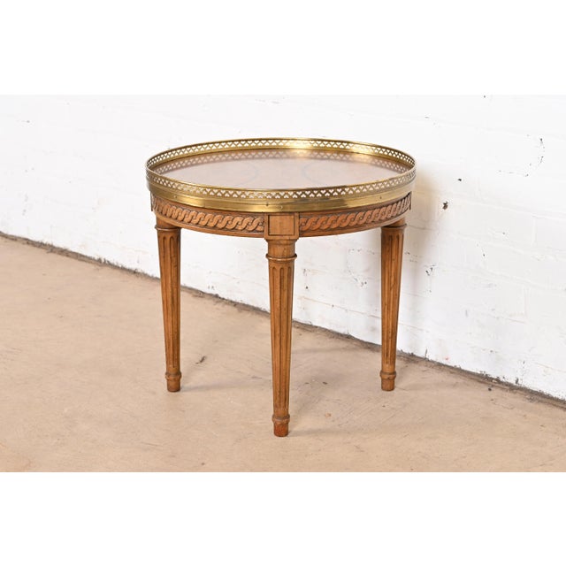 A gorgeous French Regency Louis XVI style tea table or occasional side table By Baker Furniture USA, Circa 1960s Book-...