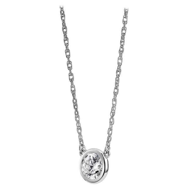 Beautiful Diamond pendant with single round brilliant cut diamond. Absolutely stunning shine and so perfect for everyday...