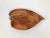 This is a beautiful, hand carved wooden bowl in the shape of a leaf. Holding it in the hand and feeling the silky...