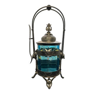 Antique Reed & Barton Silverplate Cherub Themed Pickle Castor With Aqua Glass For Sale